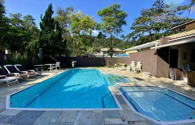 Imagem: A casa em condomínio possui 5 Dormitórios, 5 Banheiros, 4