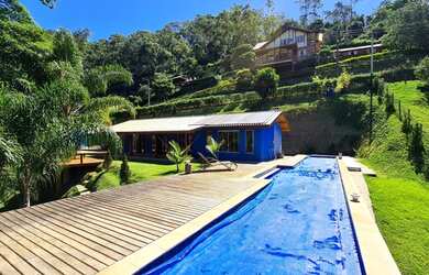 Imagem: A casa em condomínio possui 4 Dormitórios, 3 Banheiros, 3