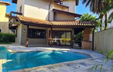 Imagem: A casa em condomínio possui 4 Dormitórios, 3 Banheiros, 4