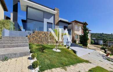 Imagem: A casa em condomínio possui 3 Dormitórios, 5 Banheiros, 2