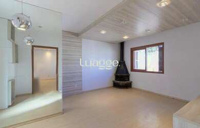 Imagem: A casa possui 4 Dormitórios, 5 Banheiros, 5 Vagas na garagem