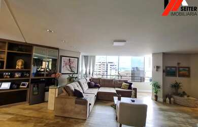 Imagem: O apartamento possui 3 Dormitórios, 5 Banheiros, 2 Vagas na