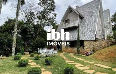 Imagem: A casa possui 5 Dormitórios, 5 Banheiros, 4 Vagas na garagem