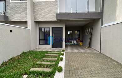 Imagem: A casa possui 3 Dormitórios, 3 Banheiros, 2 Vagas na garagem