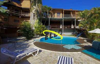 Imagem: A casa em condomínio possui 4 Dormitórios, 5 Banheiros, 5