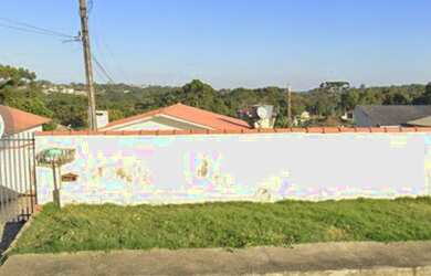 Imagem: A casa possui 2 Dormitórios, 1 Banheiro, 3 Vagas na garagem