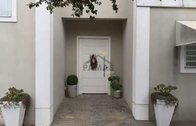 Imagem: A casa em condomínio possui 4 Dormitórios, 4 Banheiros, 2