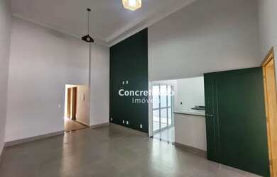 Imagem: A casa possui 3 Dormitórios, 2 Banheiros, 3 Vagas na garagem