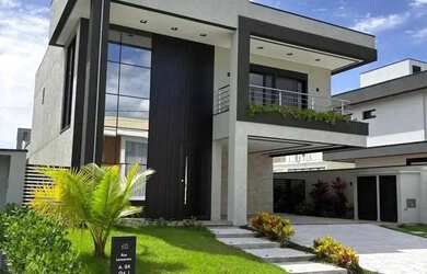 Imagem: A casa possui 4 Dormitórios, 4 Banheiros, 4 Vagas na garagem