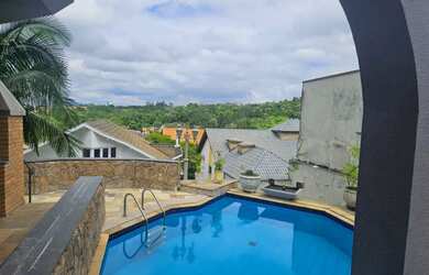 Imagem: A casa em condomínio possui 4 Dormitórios, 5 Banheiros, 4