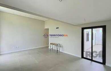 Imagem 9: Casa em Porto Alegre, no bairro Hípica, com 3 dormitório s , e 3 banheiros,...