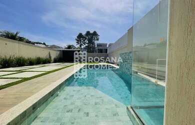 Imagem: A casa em condomínio possui 4 Dormitórios, 5 Banheiros, 4