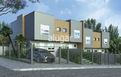 Imagem: A casa possui 3 Dormitórios, 3 Banheiros, 2 Vagas na garagem