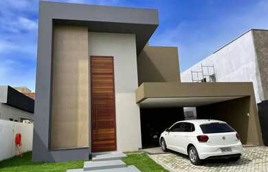 Imagem: A casa possui 3 Dormitórios, 5 Banheiros, 4 Vagas na garagem