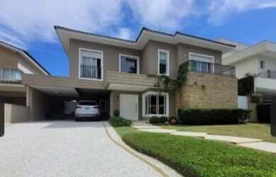 Imagem: A casa em condomínio possui 4 Dormitórios, 5 Banheiros, 4