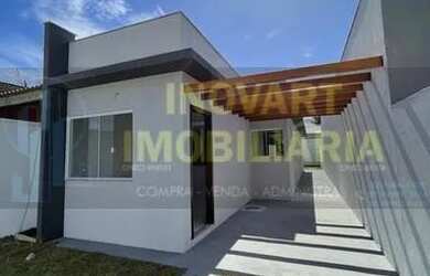 Imagem: A casa possui 3 Dormitórios, 1 Banheiro, 2 Vagas na garagem