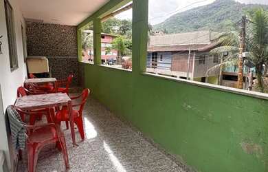 Imagem: A casa possui 3 Dormitórios, 2 Banheiros e 1 Vaga na garagem