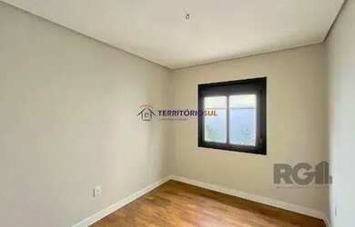 Imagem 12: Casa em Porto Alegre, no bairro Hípica, com 3 dormitório s , e 3 banheiros,...