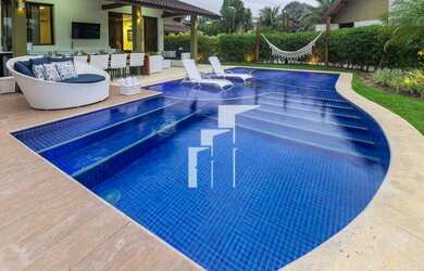 Imagem: A casa possui 4 Dormitórios, 4 Banheiros, 10m² de Área e