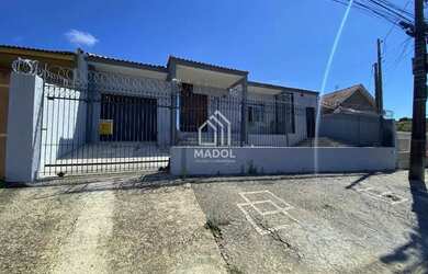 Imagem: A casa possui 3 Dormitórios, 2 Banheiros, 4 Vagas na garagem