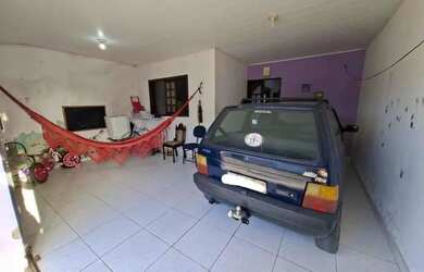 Imagem: A casa possui 2 Dormitórios, 2 Banheiros e 1 Vaga na garagem