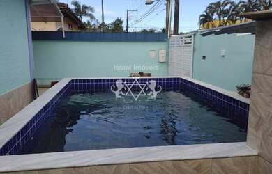 Imagem: A casa possui 3 Dormitórios, 1 Banheiro, 5 Vagas na garagem