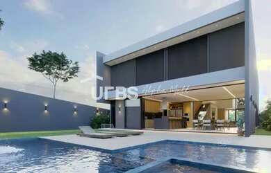 Imagem: A casa possui 4 Dormitórios, 5 Banheiros, 5 Vagas na garagem