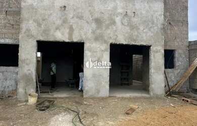 Imagem: A casa possui 2 Dormitórios, 1 Banheiro, 1 Vaga na garagem