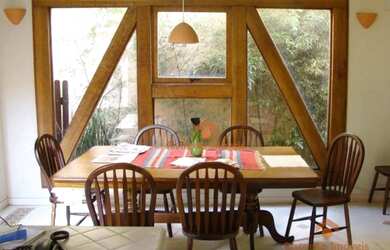 Imagem: A casa possui 3 Dormitórios, 3 Banheiros, 5 Vagas na garagem