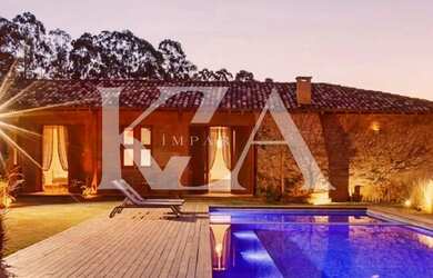 Imagem: A casa em condomínio possui 5 Dormitórios, 5 Banheiros, 5