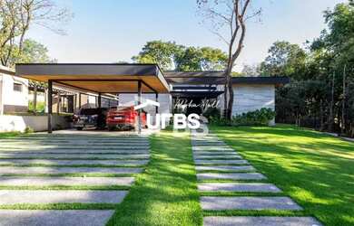 Imagem: A casa em condomínio possui 4 Dormitórios, 5 Banheiros, 2