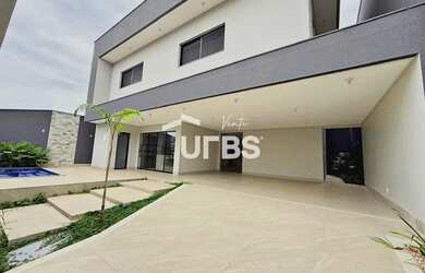 Imagem: A casa possui 4 Dormitórios, 5 Banheiros, 3 Vagas na garagem