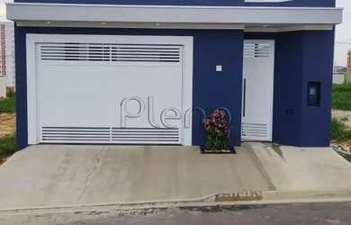 Imagem: A casa possui 3 Dormitórios, 3 Banheiros, 2 Vagas na garagem