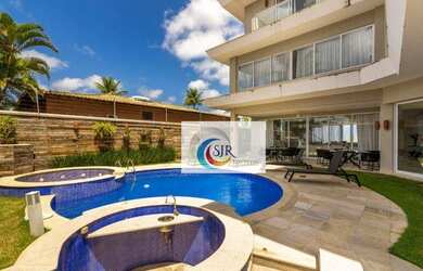 Imagem: A casa possui 5 Dormitórios, 5 Banheiros, 5 Vagas na garagem