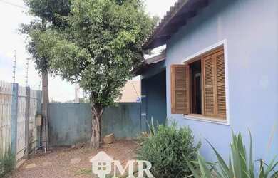 Imagem: A casa possui 2 Dormitórios, 1 Banheiro, 3 Vagas na garagem