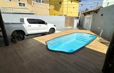 Imagem: A casa possui 5 Dormitórios, 3 Banheiros, 3 Vagas na garagem