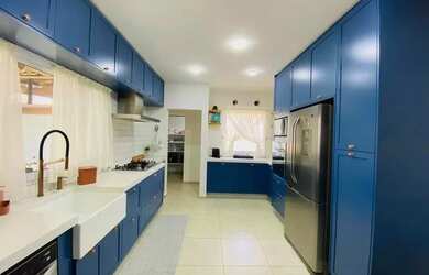 Imagem: A casa em condomínio possui 4 Dormitórios, 5 Banheiros, 5