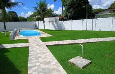 Imagem: A casa possui 2 Dormitórios, 4 Banheiros, 4 Vagas na garagem