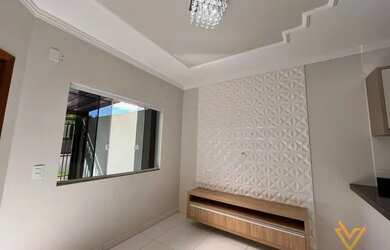 Imagem: A casa possui 3 Dormitórios, 2 Banheiros, 2 Vagas na garagem