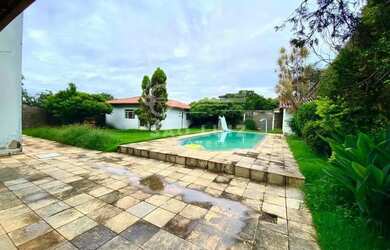 Imagem: A casa possui 5 Dormitórios, 5 Banheiros, 5 Vagas na garagem