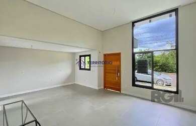 Imagem 8: Casa em Porto Alegre, no bairro Hípica, com 3 dormitório s , e 3 banheiros,...