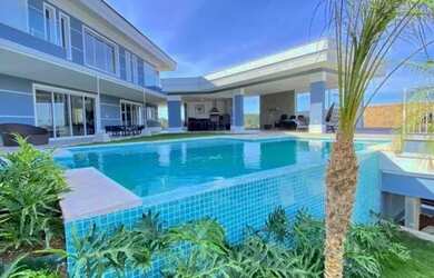 Imagem: A casa em condomínio possui 4 Dormitórios, 5 Banheiros, 5