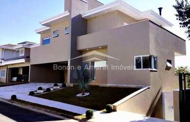 Imagem: A casa em condomínio possui 4 Dormitórios, 5 Banheiros, 5