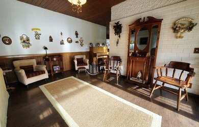 Imagem: A casa possui 4 Dormitórios, 5 Banheiros, 5 Vagas na garagem