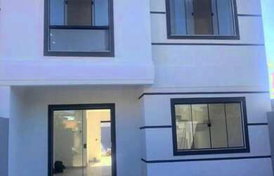 Imagem: A casa possui 3 Dormitórios, 2 Banheiros, 2 Vagas na garagem