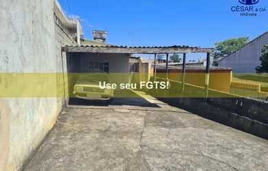 Imagem: A casa possui 2 Dormitórios, 1 Banheiro, 3 Vagas na garagem