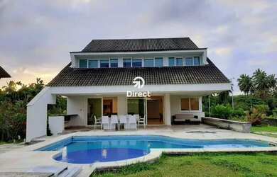 Imagem: A casa possui 4 Dormitórios, 5 Banheiros, 5 Vagas na garagem