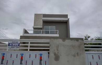 Imagem: A casa possui 3 Dormitórios, 3 Banheiros, 3 Vagas na garagem