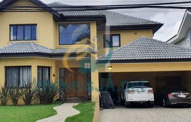 Imagem: A casa possui 4 Dormitórios, 5 Banheiros, 5 Vagas na garagem