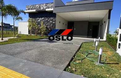 Imagem: A casa possui 3 Dormitórios, 5 Banheiros, 4 Vagas na garagem